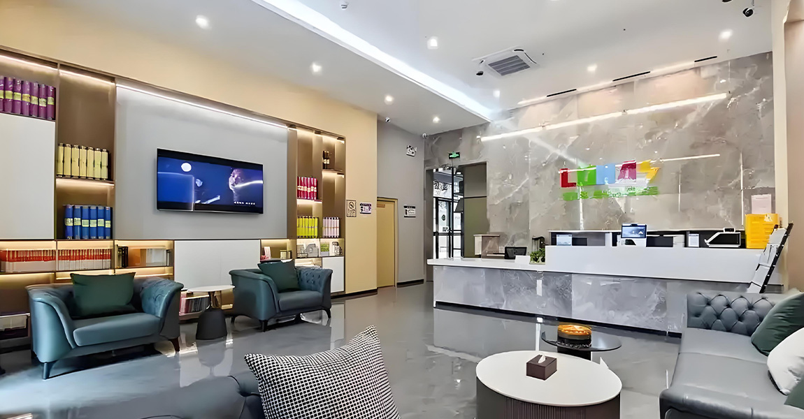 Modern reception area featuring a digital display for information and entertainment.