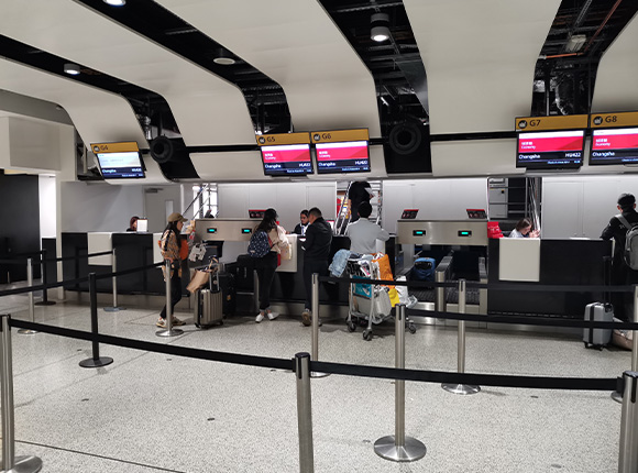Passengers going through security at the airport