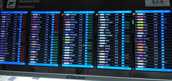 Airports use large-format digital signage to display flight information